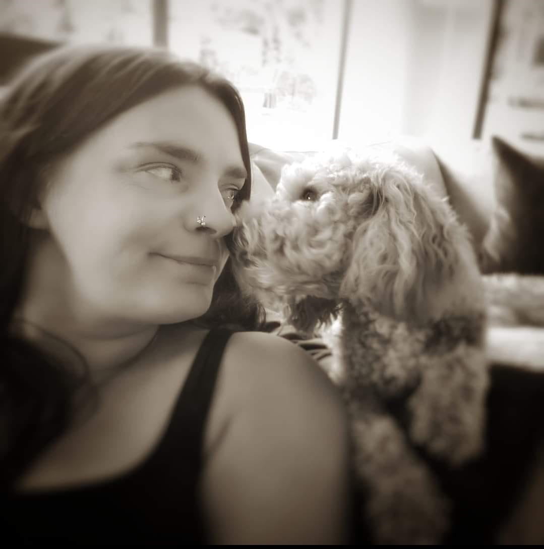 Lady sat with dog